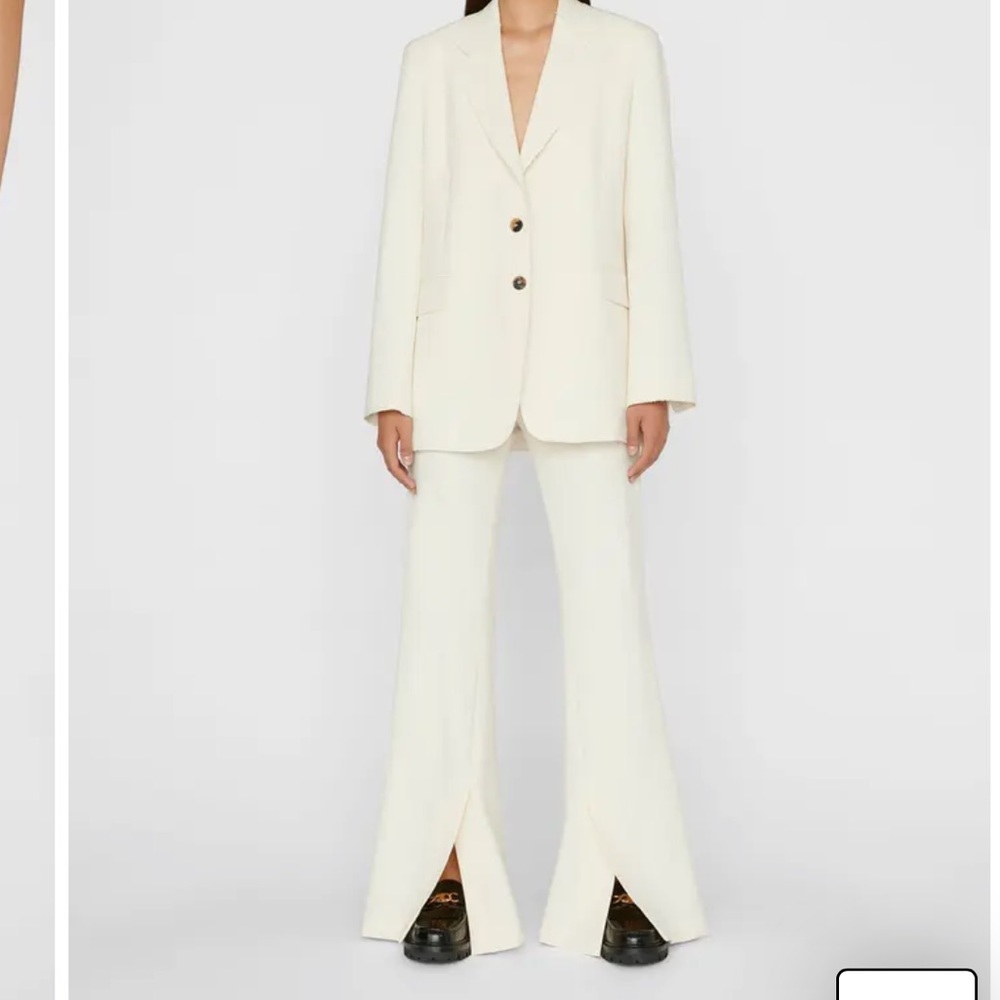 FRAME Slim Slit Hem Exaggerated Flare Pants